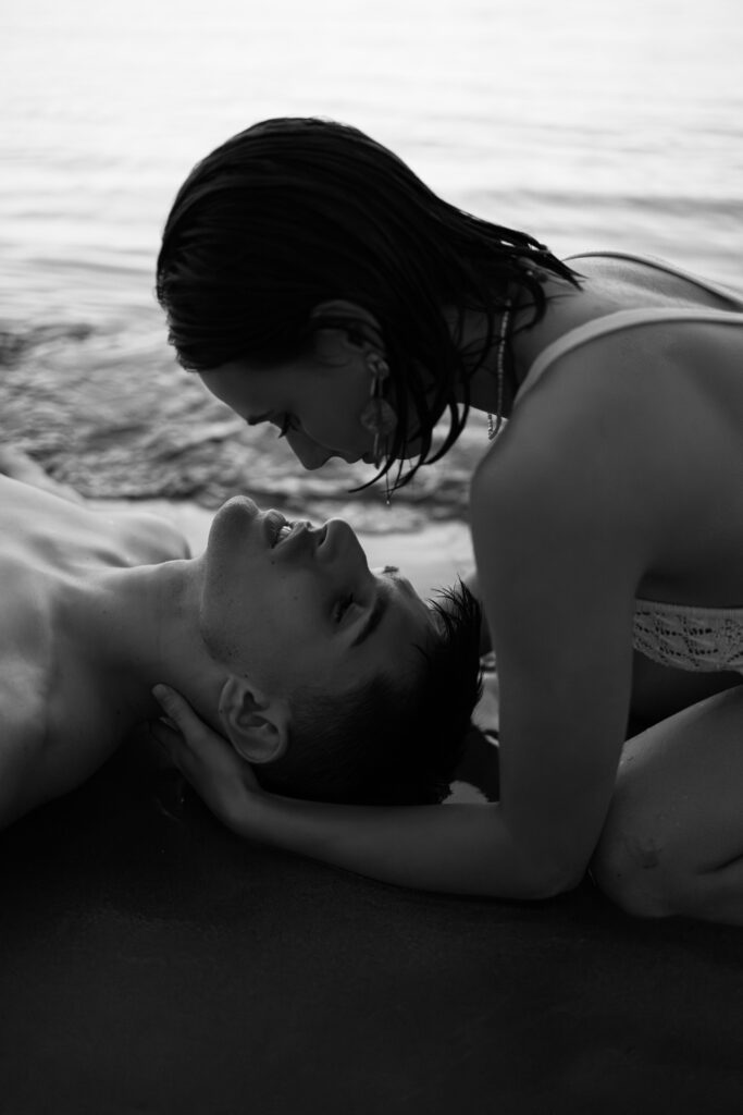 Couple photoshoot on the beach during the sunset in Spain, black and white
