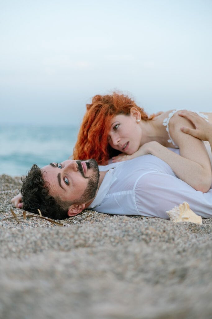 Wedding session in Spain, couple laying on the sun, BLUELENS Photo