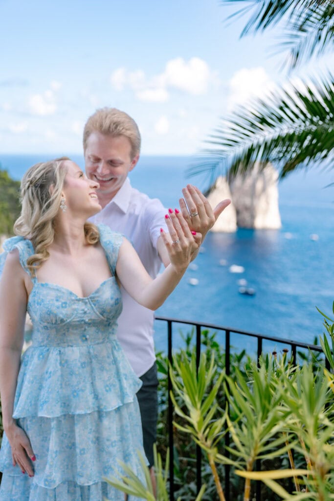 Honeymoon session in Capri in Augustus Gardens with faraglioni rocks